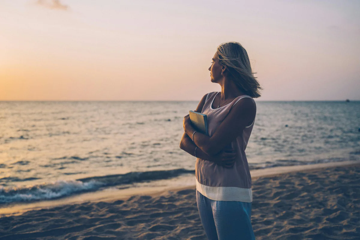 Woman managing menopause with acupuncture